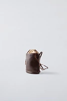 LEATHER BUCKET CROSSBODY BAG