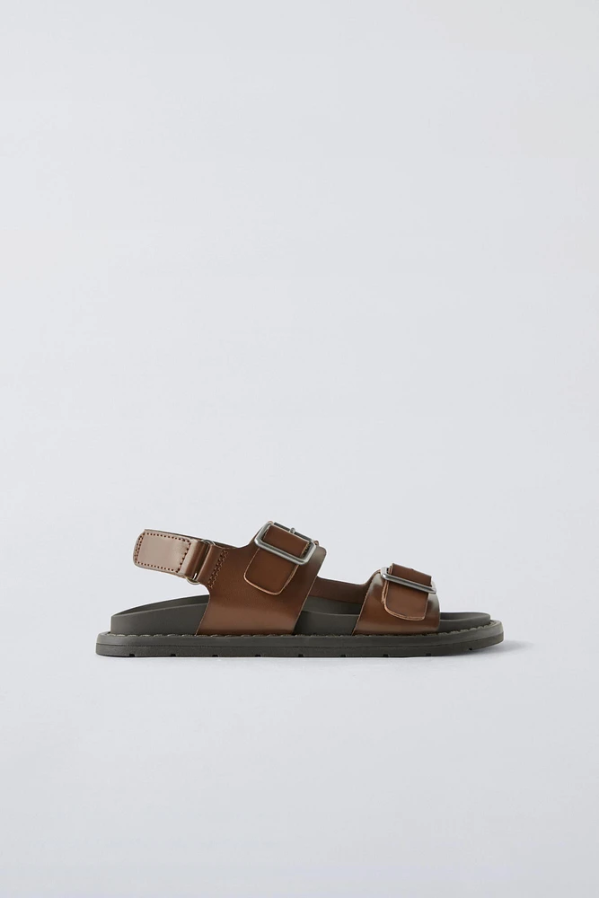 BUCKLED SANDALS