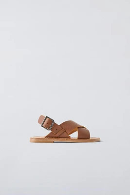 LEATHER CRISSCROSS SANDALS