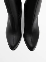 Heeled leather boots