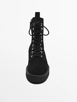 Lace-up ankle boots with track soles