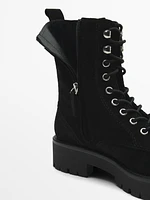 Lace-up ankle boots with track soles