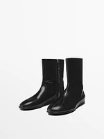 Faux-patent finish flat ankle boots