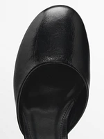 Heeled shoes with rounded toe