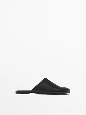 Flat leather mules