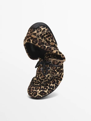 Animal print deck shoes