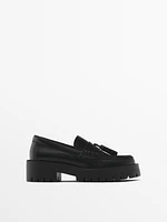 Track sole loafers with tassels