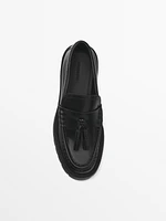 Track sole loafers with tassels