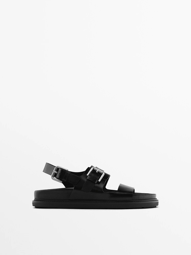 Flat slider sandals with buckles