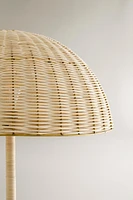 NANUSHKA RATTAN AND BRASS FLOOR LAMP