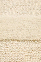 NANUSHKA IRREGULAR WOOL AREA RUG