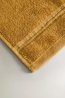 TOWEL WITH RIBBED BORDER