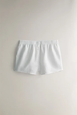 LINEN SHORTS WITH BUTTONS