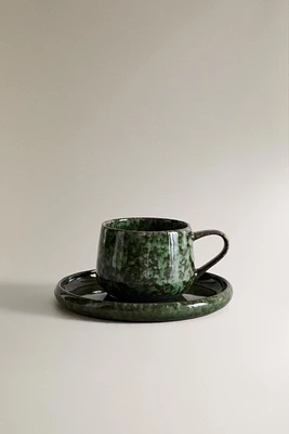 GREEN STONEWARE COFFEE CUP AND SAUCER