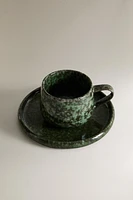 GREEN STONEWARE COFFEE CUP AND SAUCER