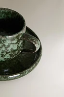 GREEN STONEWARE COFFEE CUP AND SAUCER