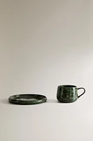 GREEN STONEWARE COFFEE CUP AND SAUCER