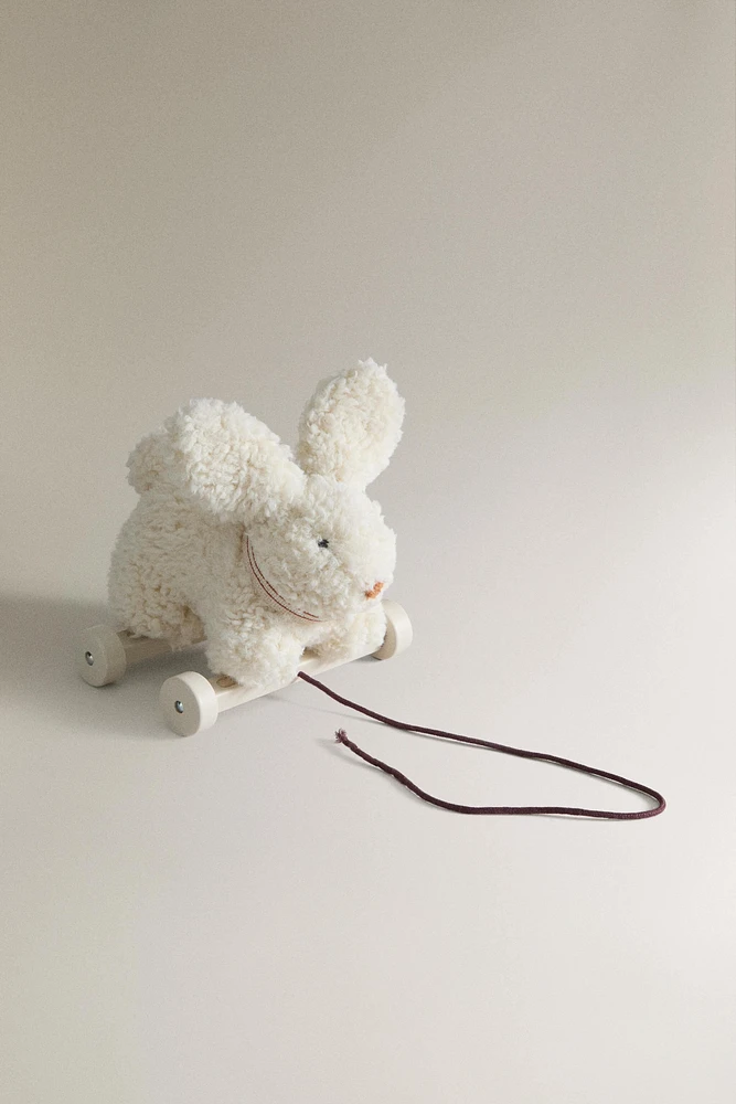 CHILDREN'S PLUSH TOY RABBIT WITH WHEELS