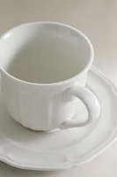 PORCELAIN COFFEE CUP AND SAUCER