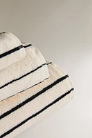 TOWEL WITH IRREGULAR STRIPES