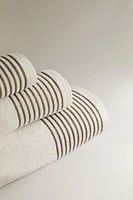 COTTON BATH TOWEL WITH A STRIPED BORDER