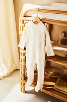 CHILDREN’S CUTWORK FOOTED ROMPER