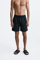 LONGLINE SWIMMING TRUNKS