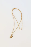 PACK OF TWO BEAD AND CHARM NECKLACES PLATED IN 24K GOLD