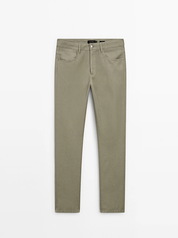 Tapered-fit denim trousers