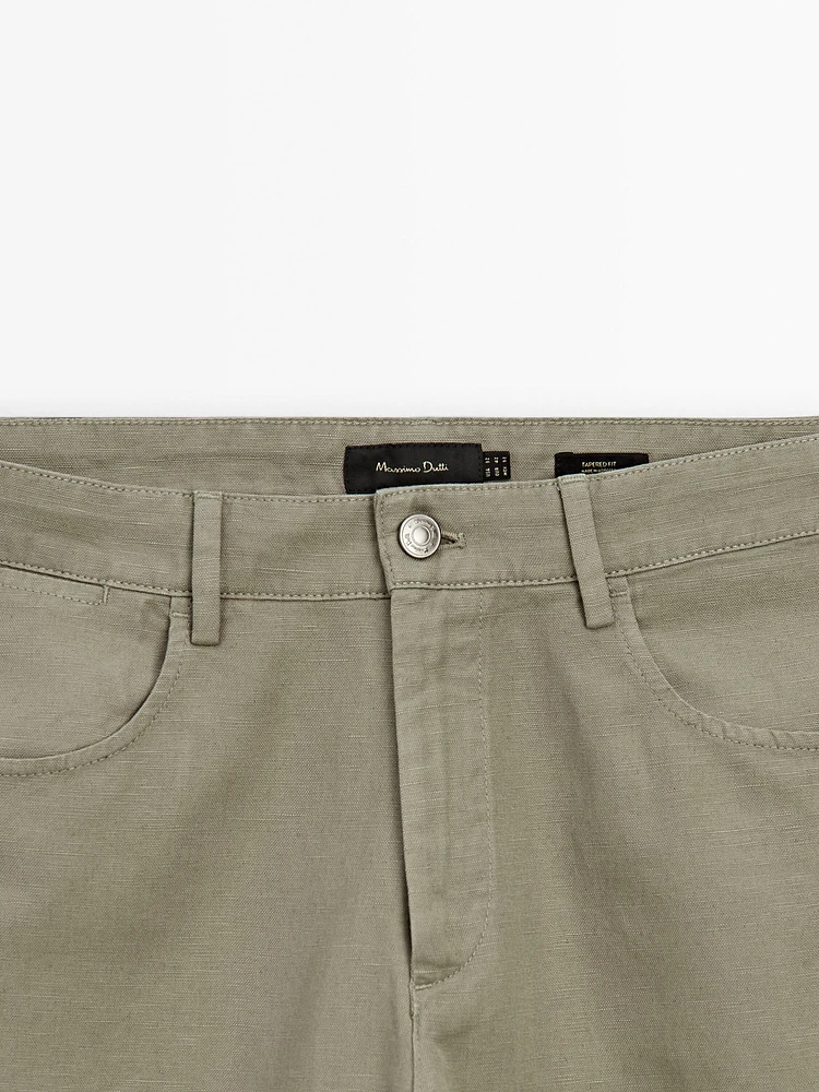 Tapered-fit denim trousers