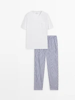 Striped pyjama bottoms and short sleeve T-shirt