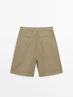 High-waist cotton blend Bermuda shorts with darts