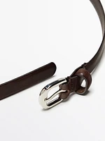 Leather belt with round buckle