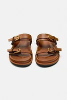 BUCKLED SANDALS