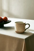 MUG WITH RAISED DESIGN