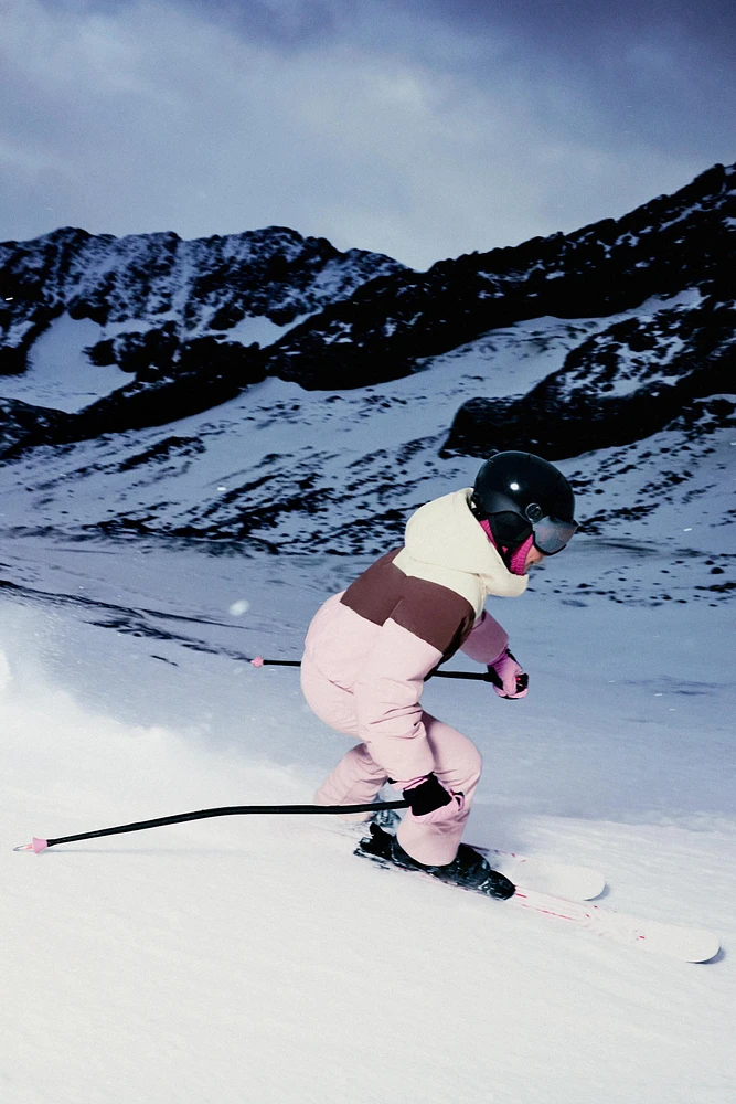 WINDPROOF AND WATER REPELLENT RECCO® SYSTEM DOWN ANS FEATHER FILL JUMPSUIT SKI COLLECTION