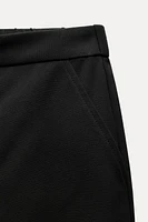 TAPERED FIT PLEATED HEM PANTS