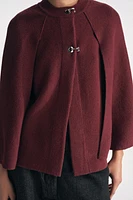 MANTEAU CAPE EN MAILLE
