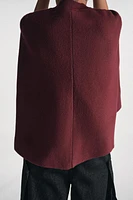 MANTEAU CAPE EN MAILLE