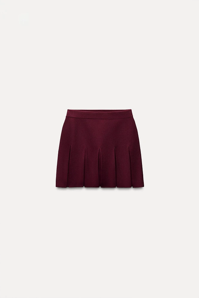 BOX PLEAT KNIT MINI SKIRT