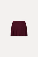 BOX PLEAT KNIT MINI SKIRT