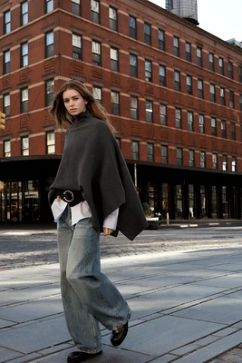 ASYMMETRIC KNIT CAPE