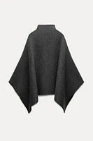 ASYMMETRIC KNIT CAPE