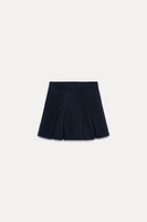 BOX PLEAT KNIT MINI SKIRT