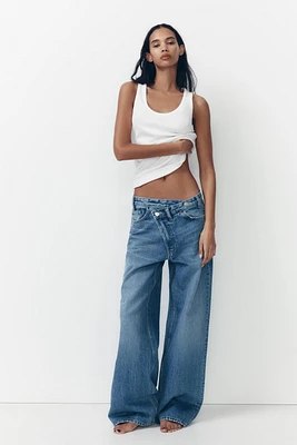 TRF HIGH RISE WIDE LEG CROSSOVER WAISTBAND JEANS