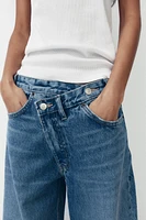 TRF HIGH RISE WIDE LEG CROSSOVER WAISTBAND JEANS