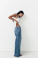 TRF HIGH RISE WIDE LEG CROSSOVER WAISTBAND JEANS