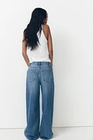 TRF HIGH RISE WIDE LEG CROSSOVER WAISTBAND JEANS