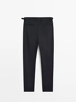 Tapered fit trousers with buckle detail