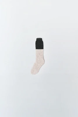 CHAUSSETTES HAUTES EN MAILLE ÉDITION LIMITÉE